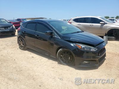 Czwarte zdjęcie samochodu z boku: 2016 FORD FOCUS ST VIN:1FADP3L93GL383262 - miniatura