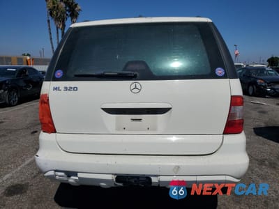 Zdjęcie 6 z 13 samochodu: 2002 MERCEDES-BENZ ML 320 VIN:4JGAB54E92A334814 - miniatura