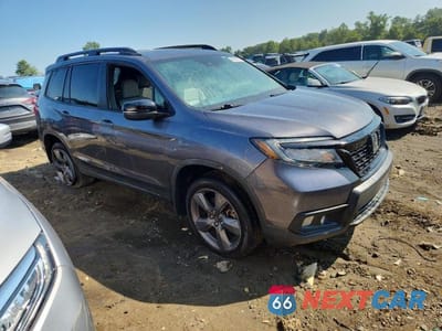Czwarte zdjęcie samochodu z boku: 2021 HONDA PASSPORT TOURING VIN:5FNYF8H96MB021641 - miniatura