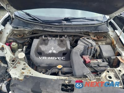 Zdjęcie 12 z 13 samochodu: 2010 MITSUBISHI OUTLANDER XLS VIN:JA4JT3AX1AZ601711 - miniatura