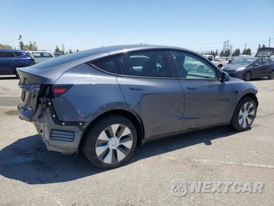 Trzecie zdjęcie samochodu z tyłu: 2023 TESLA MODEL Y VIN:7SAYGDEE9PA089833 - miniatura