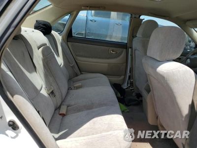 Zdjęcie 11 z 14 samochodu: 2004 TOYOTA AVALON XL VIN:4T1BF28B14U380999 - miniatura
