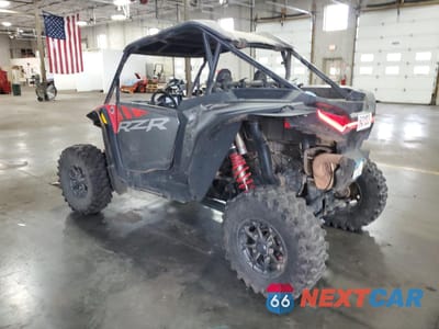 Czwarte zdjęcie samochodu z boku: 2024 POLARIS RZR XP 1000 ULTIMATE VIN:3NSNEF997RF301843 - miniatura