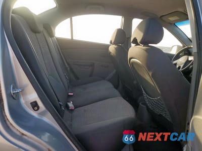 Zdjęcie 10 z 13 samochodu: 2010 KIA RIO LX VIN:KNADH4A3XA6673089 - miniatura