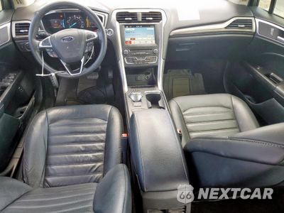 Zdjęcie 8 z 12 samochodu: 2017 FORD FUSION SE HYBRID VIN:3FA6P0LU0HR409606 - miniatura