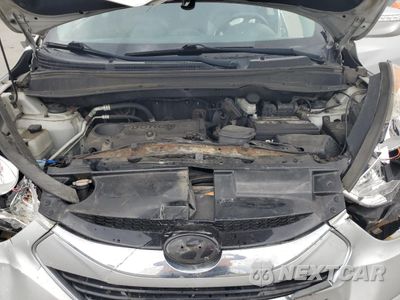 Zdjęcie 12 z 13 samochodu: 2011 HYUNDAI TUCSON GLS VIN:KM8JUCAC0BU281369 - miniatura