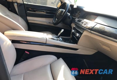 Piąte zdjęcie samochodu w środku: 2012 BMW 750 LXI VIN:WBAKC8C58CC435970 - miniatura
