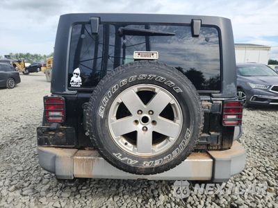 Zdjęcie 6 z 13 samochodu: 2011 JEEP WRANGLER UNLIMITED SAHARA VIN:1J4HA5H11BL519483 - miniatura