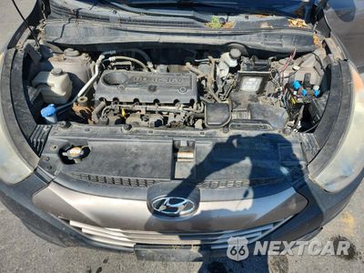 Zdjęcie 12 z 14 samochodu: 2011 HYUNDAI TUCSON GLS VIN:KM8JU3AC4BU185843 - miniatura