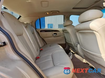 Zdjęcie 10 z 12 samochodu: 1999 LINCOLN TOWN CAR CARTIER VIN:1LNHM83W0XY607285 - miniatura