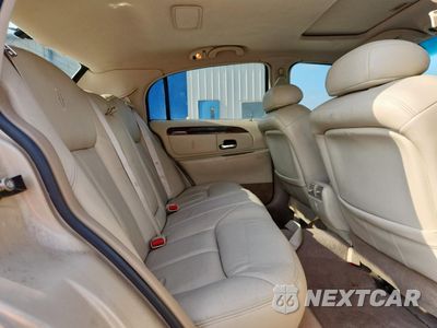 Zdjęcie 10 z 12 samochodu: 1999 LINCOLN TOWN CAR CARTIER VIN:1LNHM83W0XY607285 - miniatura
