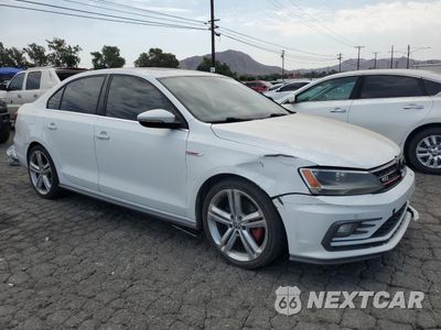 Czwarte zdjęcie samochodu z boku: 2016 VOLKSWAGEN JETTA GLI VIN:3VW5T7AJ5GM219702 - miniatura