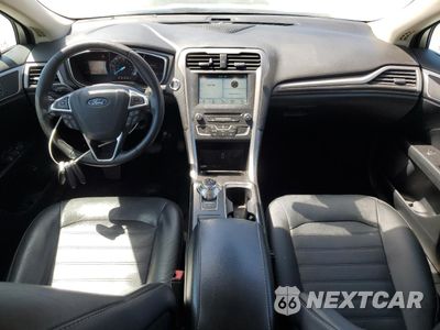 Zdjęcie 8 z 12 samochodu: 2018 FORD FUSION SE HYBRID VIN:3FA6P0LU7JR171615 - miniatura