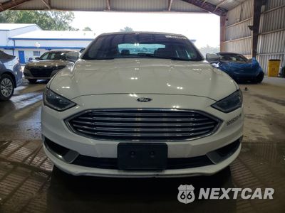Piąte zdjęcie samochodu w środku: 2018 FORD FUSION SE HYBRID VIN:3FA6P0LU1JR118683 - miniatura