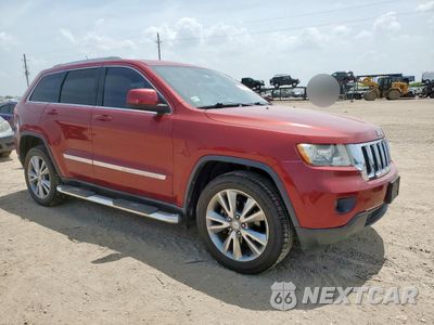 Czwarte zdjęcie samochodu z boku: 2013 JEEP GRAND CHEROKEE LAREDO VIN:1C4RJFAGXDC532332 - miniatura