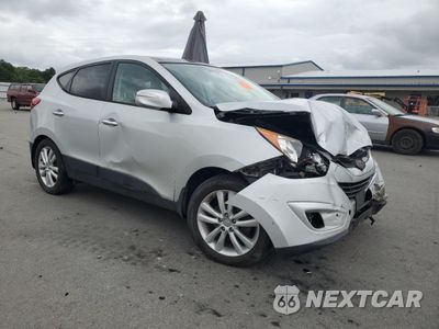 Czwarte zdjęcie samochodu z boku: 2011 HYUNDAI TUCSON GLS VIN:KM8JUCAC0BU281369 - miniatura