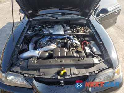 Zdjęcie 11 z 14 samochodu: 1996 FORD MUSTANG COBRA VIN:1FALP46V2TF190068 - miniatura