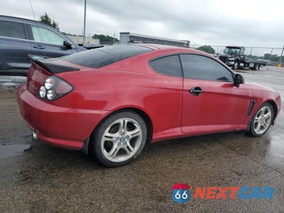 Trzecie zdjęcie samochodu z tyłu: 2005 HYUNDAI TIBURON GT VIN:KMHHN65F25U164141 - miniatura
