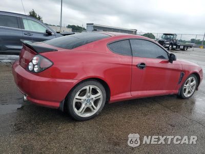 Trzecie zdjęcie samochodu z tyłu: 2005 HYUNDAI TIBURON GT VIN:KMHHN65F25U164141 - miniatura