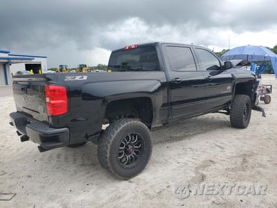 Trzecie zdjęcie samochodu z tyłu: 2017 CHEVROLET SILVERADO K1500 LT VIN:3GCUKRECXHG329606 - miniatura