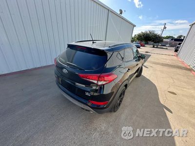 Czwarte zdjęcie samochodu z boku: 2017 HYUNDAI TUCSON LIMITED VIN:KM8J3CA27HU432663 - miniatura