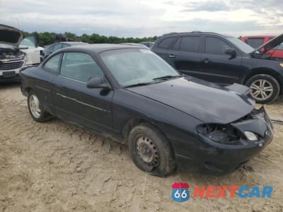 Czwarte zdjęcie samochodu z boku: 2002 FORD ESCORT ZX2 VIN:3FAFP11372R156517 - miniatura