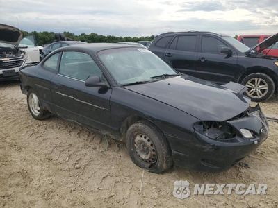 Czwarte zdjęcie samochodu z boku: 2002 FORD ESCORT ZX2 VIN:3FAFP11372R156517 - miniatura