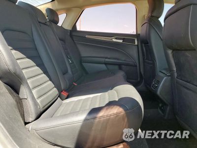 Zdjęcie 10 z 12 samochodu: 2018 FORD FUSION SE HYBRID VIN:3FA6P0LU3JR129846 - miniatura