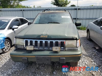 Piąte zdjęcie samochodu w środku: 1995 JEEP GRAND CHEROKEE LIMITED VIN:1J4GZ78SXSC509348 - miniatura