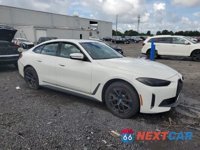 Czwarte zdjęcie samochodu z boku: 2024 BMW I4 EDRIVE 35 VIN:WBY43AW03RFR59830 - miniatura
