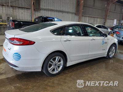 Trzecie zdjęcie samochodu z tyłu: 2018 FORD FUSION SE HYBRID VIN:3FA6P0LU1JR118683 - miniatura