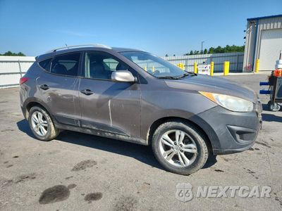 Czwarte zdjęcie samochodu z boku: 2011 HYUNDAI TUCSON GLS VIN:KM8JU3AC4BU185843 - miniatura