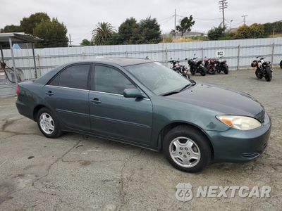 Czwarte zdjęcie samochodu z boku: 2002 TOYOTA CAMRY LE VIN:4T1BF30KX2U526217 - miniatura