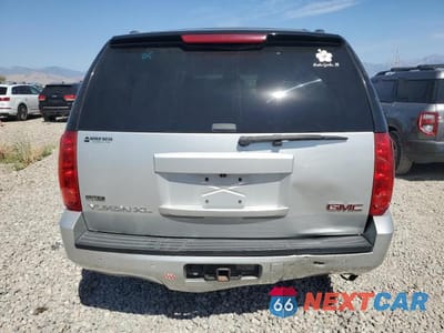 Zdjęcie 6 z 13 samochodu: 2010 GMC YUKON XL K1500 SLT VIN:1GKUKKE36AR162792 - miniatura