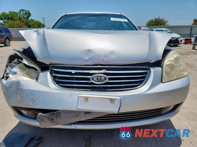 Piąte zdjęcie samochodu w środku: 2007 KIA OPTIMA LX VIN:KNAGE124375108192 - miniatura