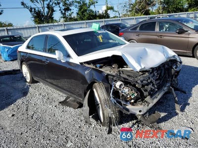 Czwarte zdjęcie samochodu z boku: 2018 GENESIS G90 PREMIUM VIN:KMHG34JA8JU039137 - miniatura