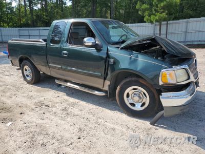 Czwarte zdjęcie samochodu z boku: 2002 FORD F150 VIN:1FTRX17W72NB17387 - miniatura