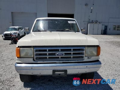 Piąte zdjęcie samochodu w środku: 1991 FORD F250 VIN:1FTHF26H6MLA08683 - miniatura