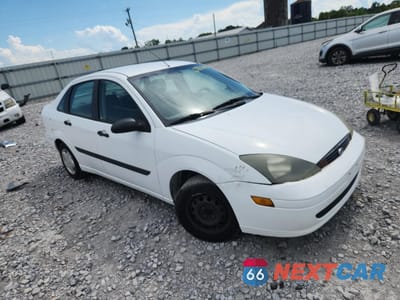 Czwarte zdjęcie samochodu z boku: 2004 FORD FOCUS LX VIN:1FAFP33P84W191529 - miniatura