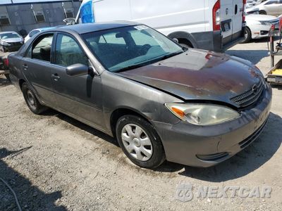 Czwarte zdjęcie samochodu z boku: 2003 TOYOTA CAMRY LE VIN:JTDBE32KX30215061 - miniatura
