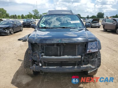 Piąte zdjęcie samochodu w środku: 2011 NISSAN XTERRA OFF ROAD VIN:5N1AN0NW2BC521396 - miniatura