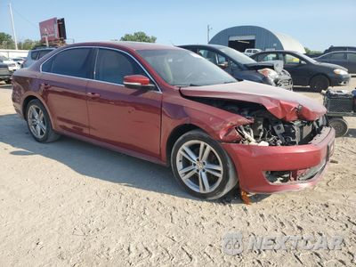 Czwarte zdjęcie samochodu z boku: 2015 VOLKSWAGEN PASSAT SE VIN:1VWBV7A39FC101554 - miniatura
