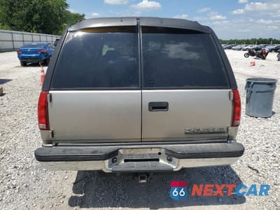 Zdjęcie 6 z 14 samochodu: 1999 CHEVROLET SUBURBAN C1500 VIN:3GNEC16R7XG112309 - miniatura