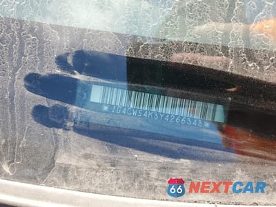 Zdjęcie 13 z 15 samochodu: 2000 BUICK PARK AVENUE VIN:1G4CW54K3Y4266343 - miniatura