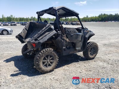 Czwarte zdjęcie samochodu z boku: 2023 POLARIS GENERAL XP - ATV AND UTILITY VEHICLES VIN:3NSGXK995PM392230 - miniatura