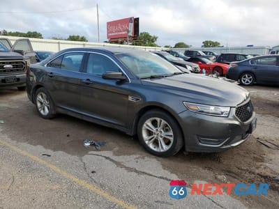 Czwarte zdjęcie samochodu z boku: 2017 FORD TAURUS SEL VIN:1FAHP2E85HG137579 - miniatura