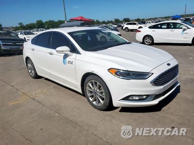 Czwarte zdjęcie samochodu z boku: 2017 FORD FUSION SE HYBRID VIN:3FA6P0LU1HR409453 - miniatura