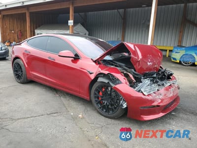 Czwarte zdjęcie samochodu z boku: 2023 TESLA MODEL S VIN:5YJSA1E65PF517234 - miniatura