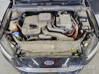 Zdjęcie 11 z 14 samochodu: 2016 FORD FUSION TITANIUM HEV VIN:3FA6P0RU6GR306373 - miniatura