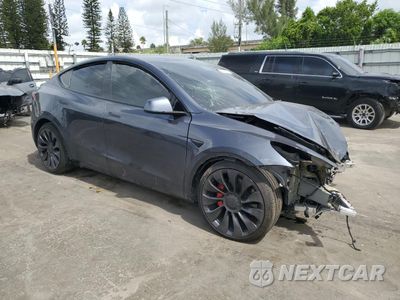 Czwarte zdjęcie samochodu z boku: 2022 TESLA MODEL Y VIN:7SAYGDEF7NF366990 - miniatura